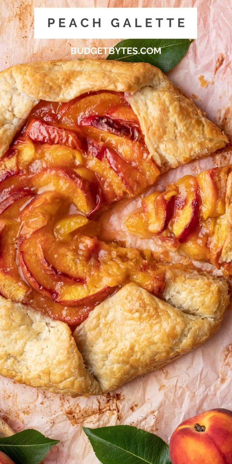 Overhead close up shot of slice being removed from Peach Galette.