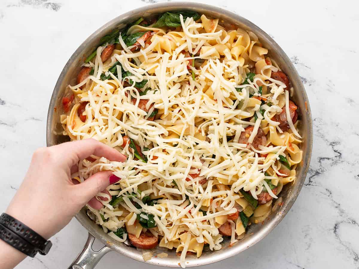 Cheese stuff widow on top of the pasta. 