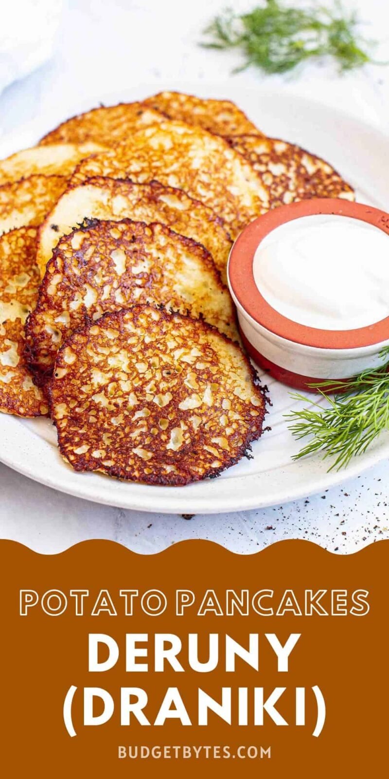 Side view of a plate of potato pancakes.