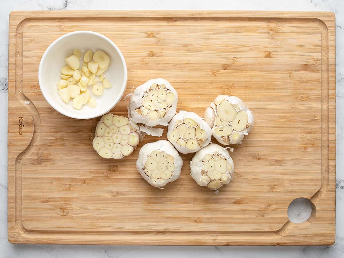 Tops removed from garlic heads.