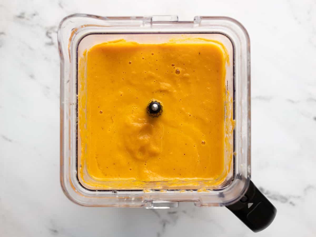 Overhead shot of blended carrot soup.