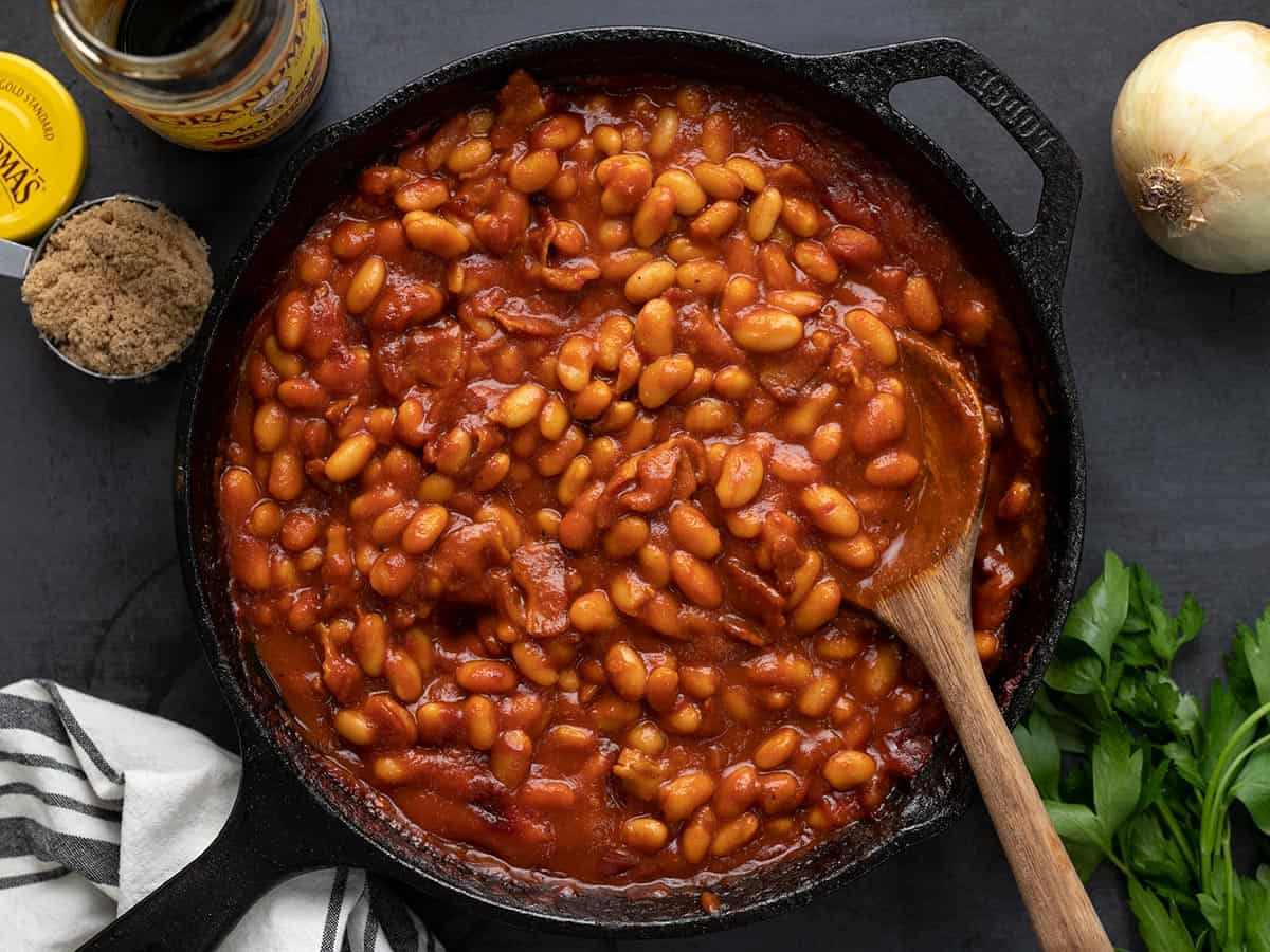 Finished baked beans stirred in the cast iron skillet.