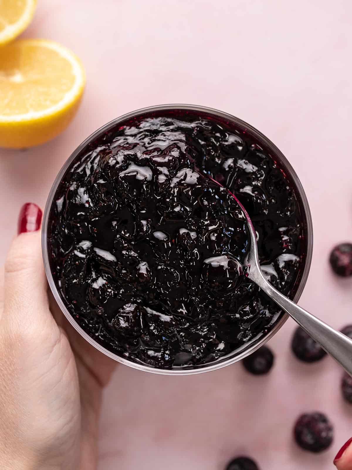 Overhead shot of blueberry sauce in a serving bowl.