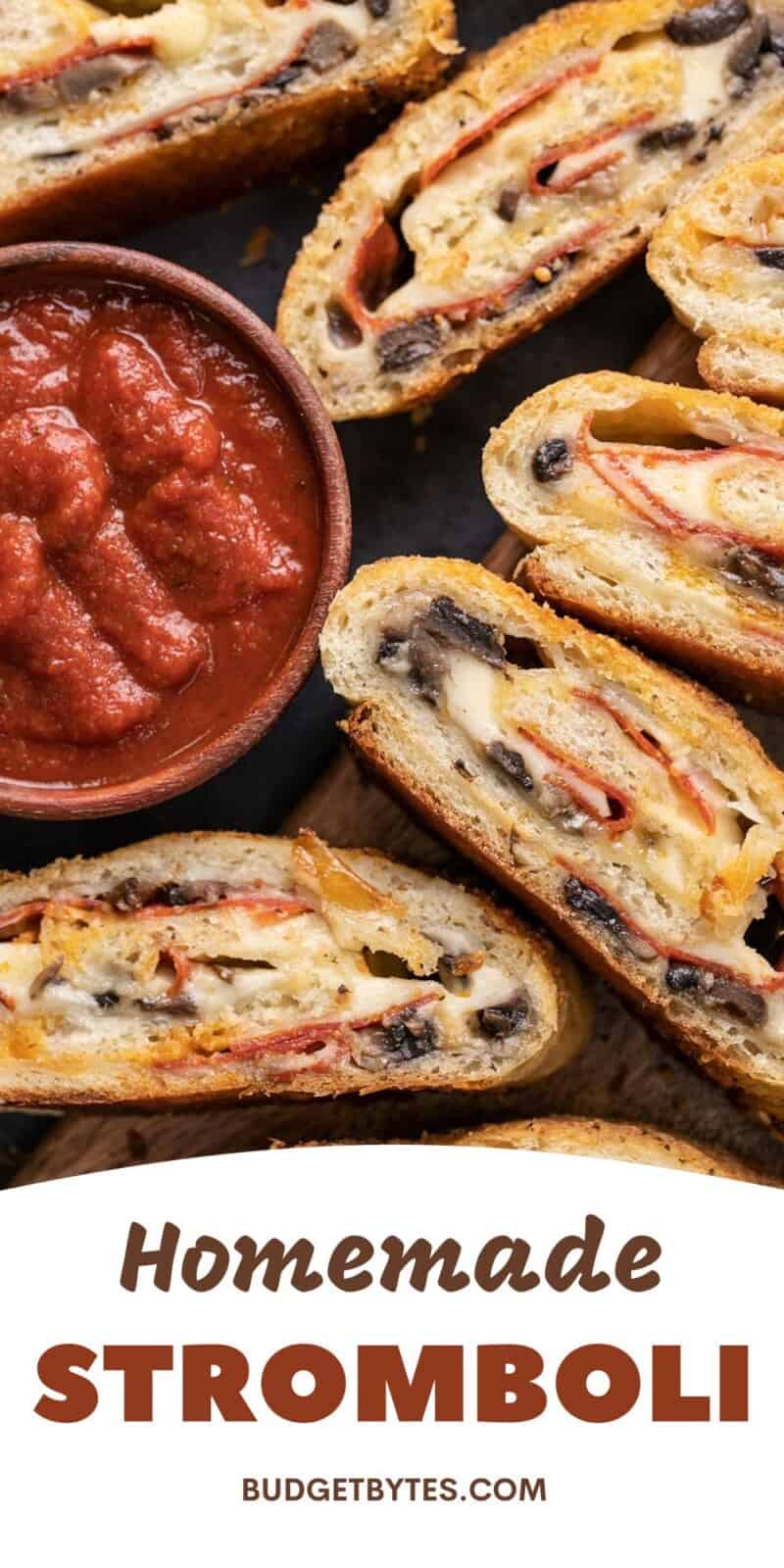 Overhead view of stromboli slices near a bowl of sauce.