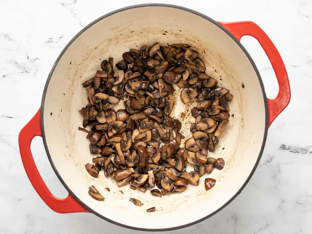 Sautéed mushrooms in the pot.