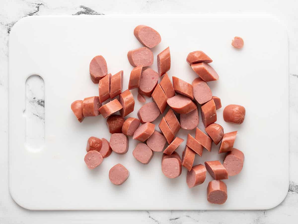 sliced sausage on a cutting board.