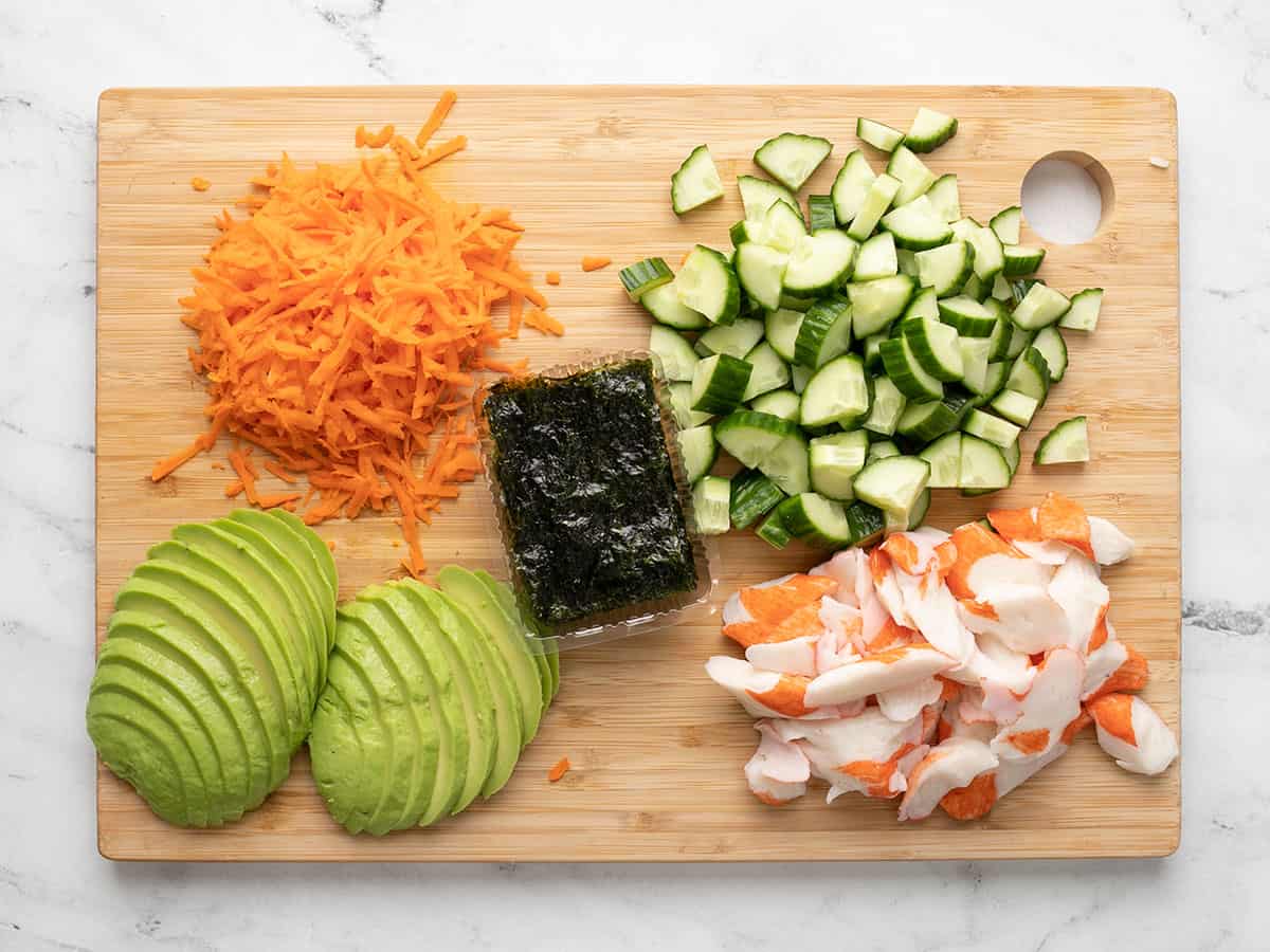 Prepped sushi bowl toppings.
