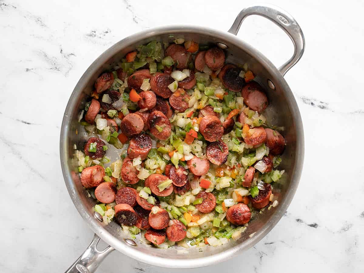 seasoning mix added to the skillet with the sausage.