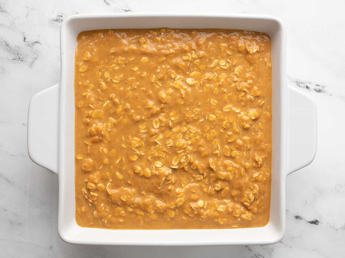 pumpkin pie oatmeal mixture in a baking dish.