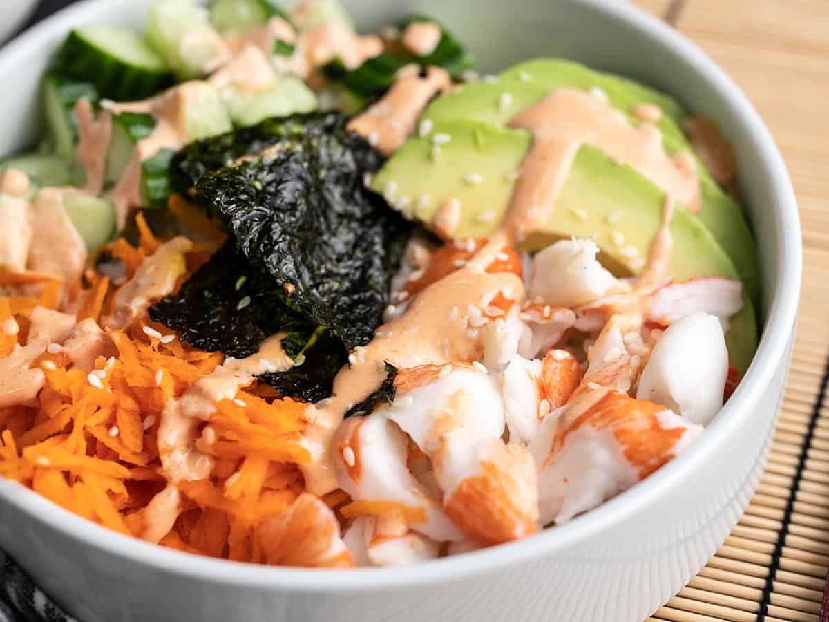 Close up side view of a sushi bowl.