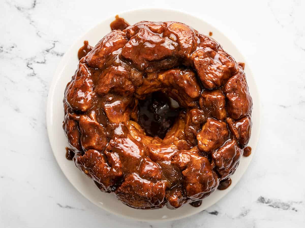 Overhead shot of monkey bread on white plate.