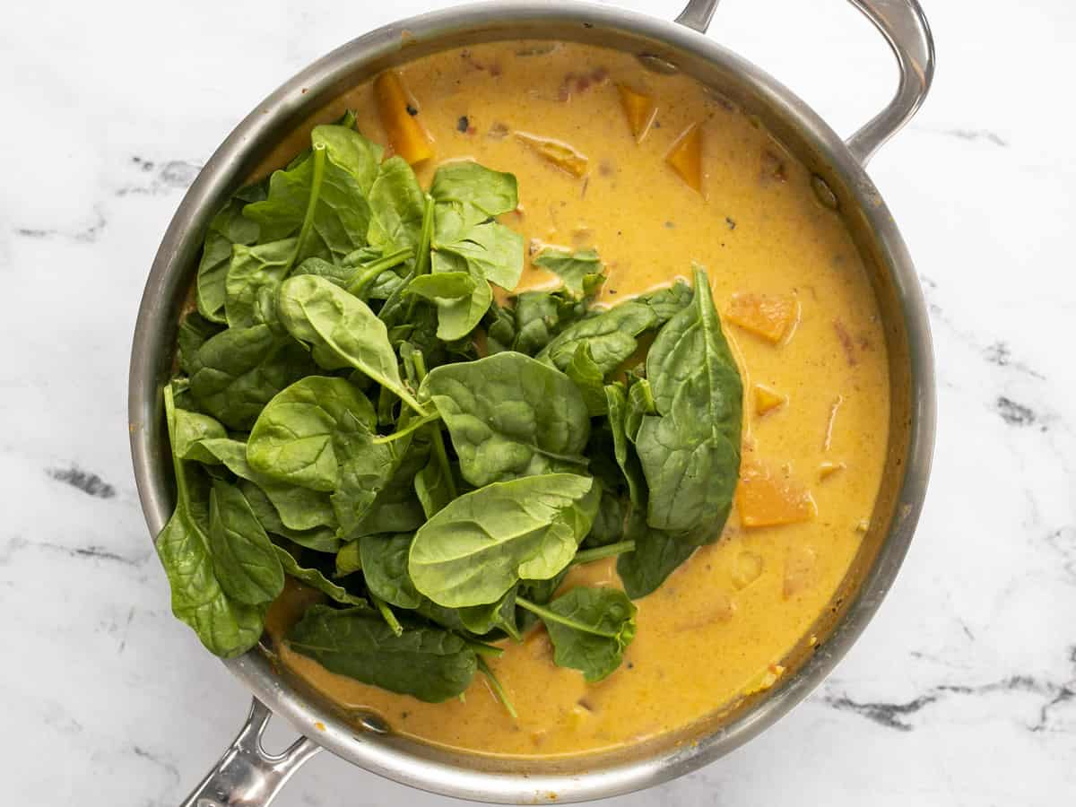 Fresh spinach added to the curry.