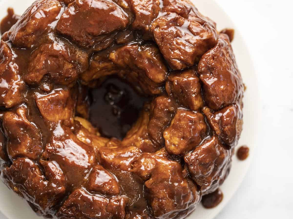 Overhead shot of monkey bread on white plate.