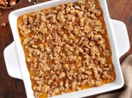Overhead view of sweet potato casserole in a baking dish.