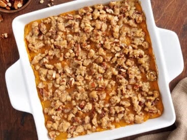 Overhead view of sweet potato casserole in a baking dish.