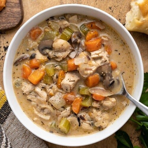 Overhead view of a bowl of turkey and wild rice soup.