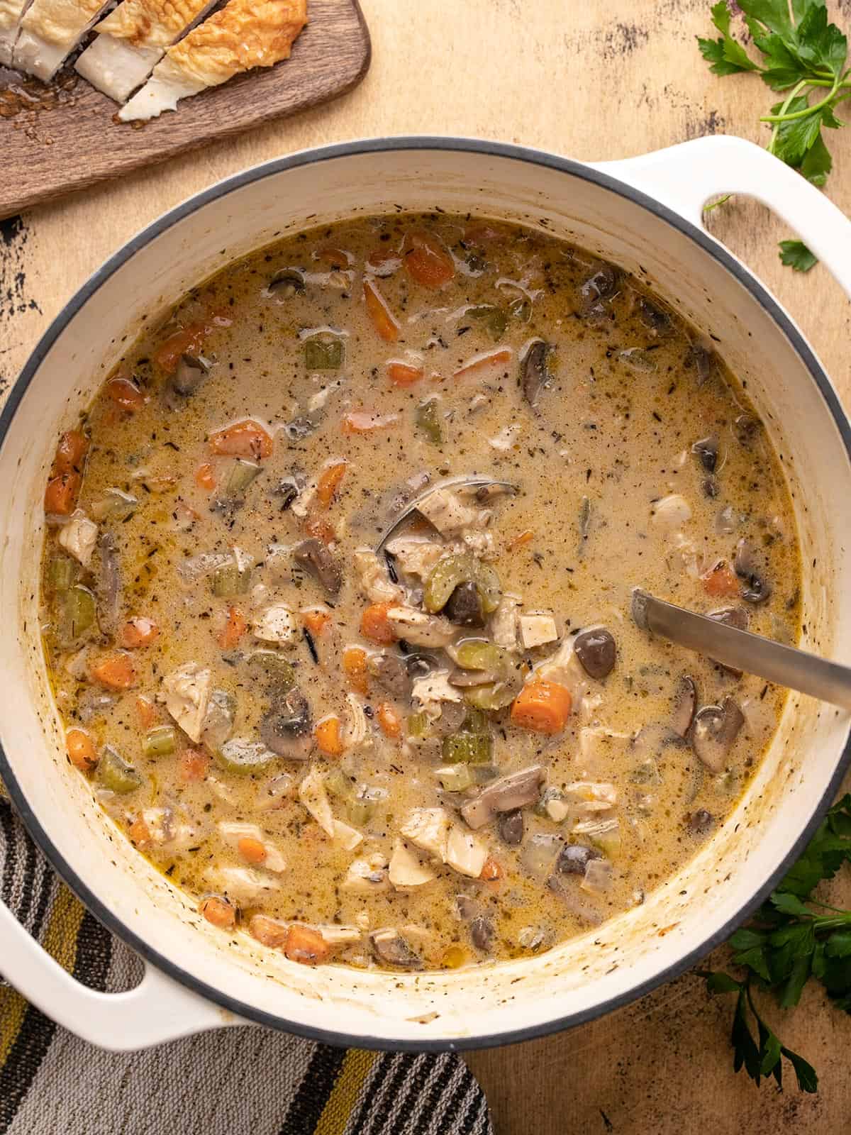 Finished pot of turkey and wild rice soup seen from above.