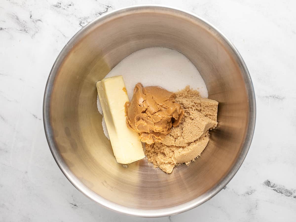 Butters and sugars in a mixing bowl. 