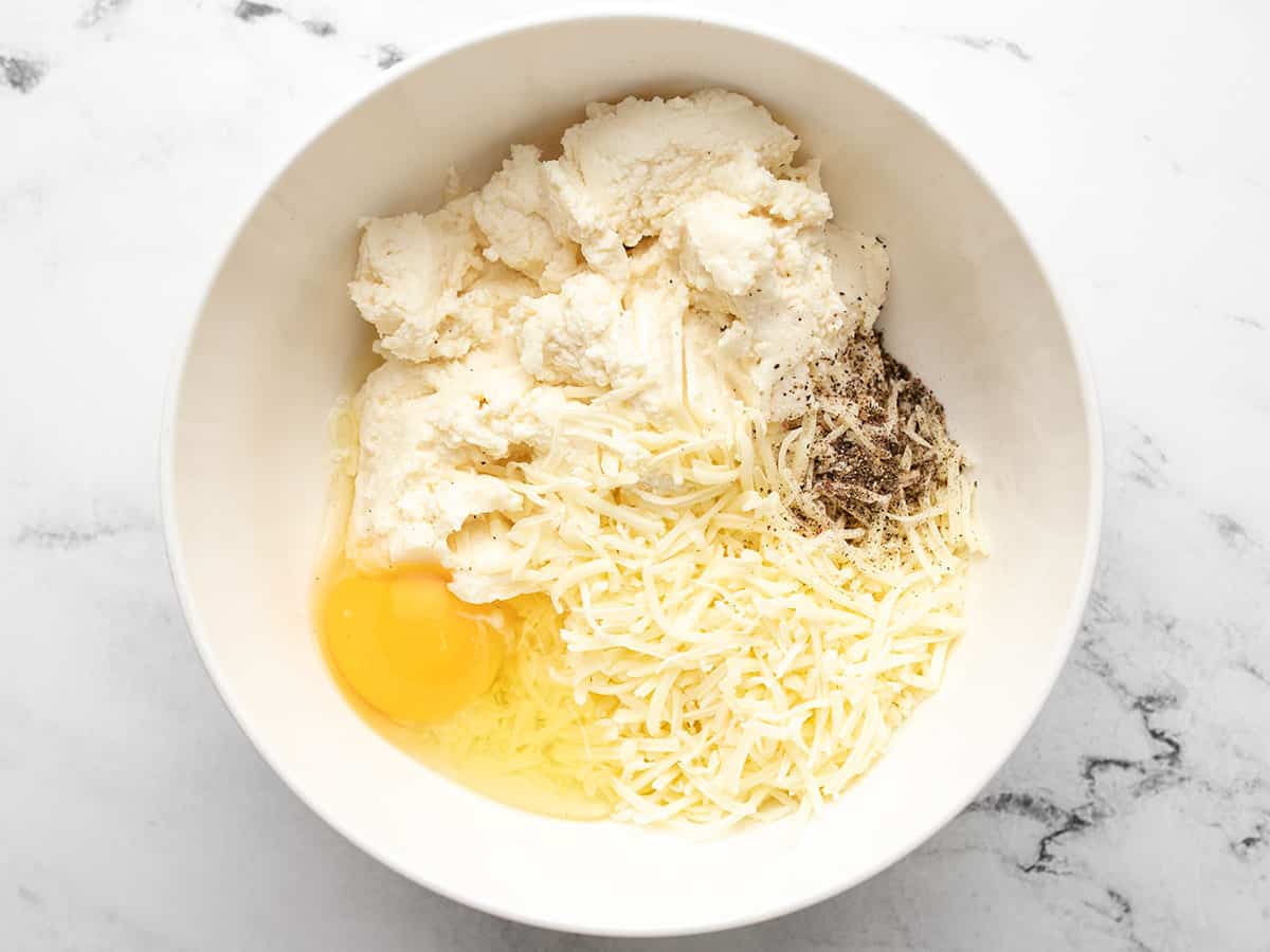 Cheese filling ingredients in a bowl.