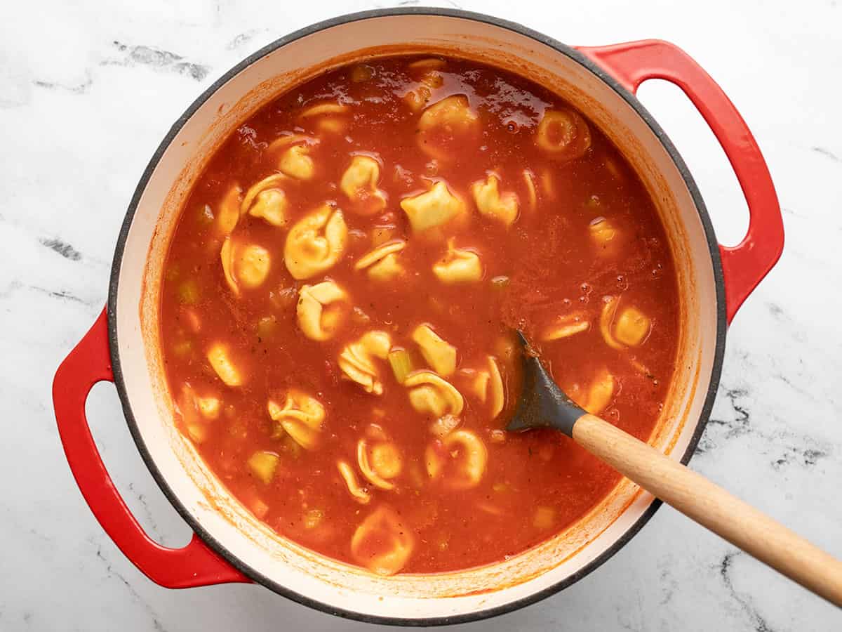 Tortellini added to the soup.