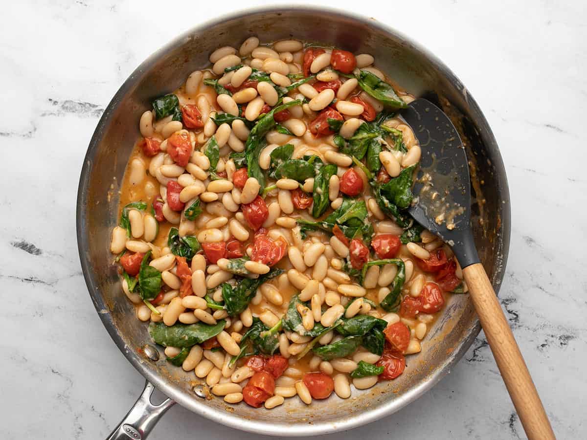 Finished saucy white beans with spinach.
