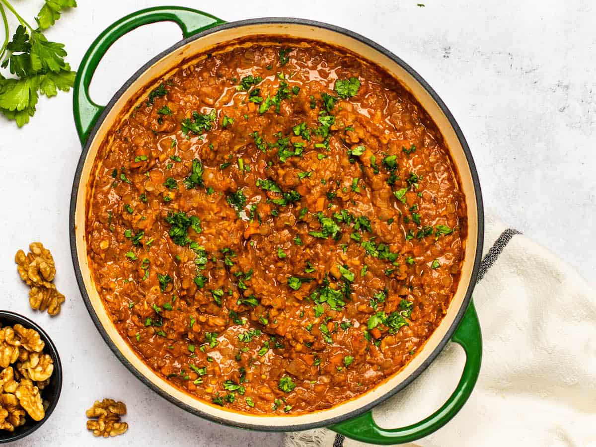 Overhead view of a Dutch Oven full of Lentil Bolognese.