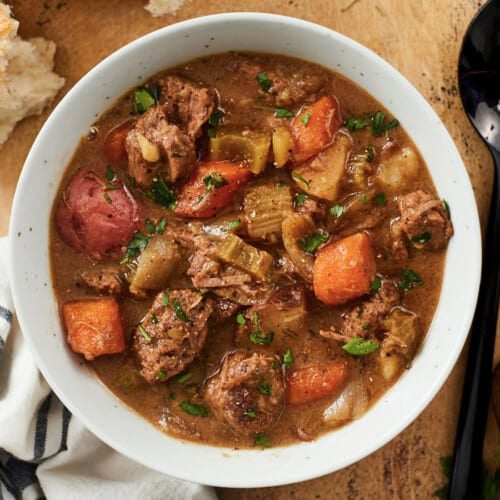 Close up overhead view of beef stew in a bowl.