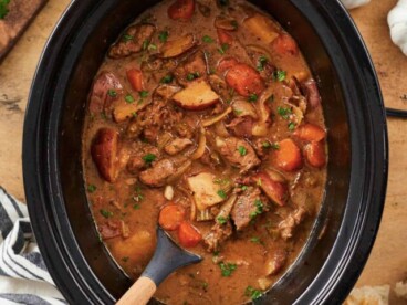 Overhead view of a beef stew in the slow cooker.