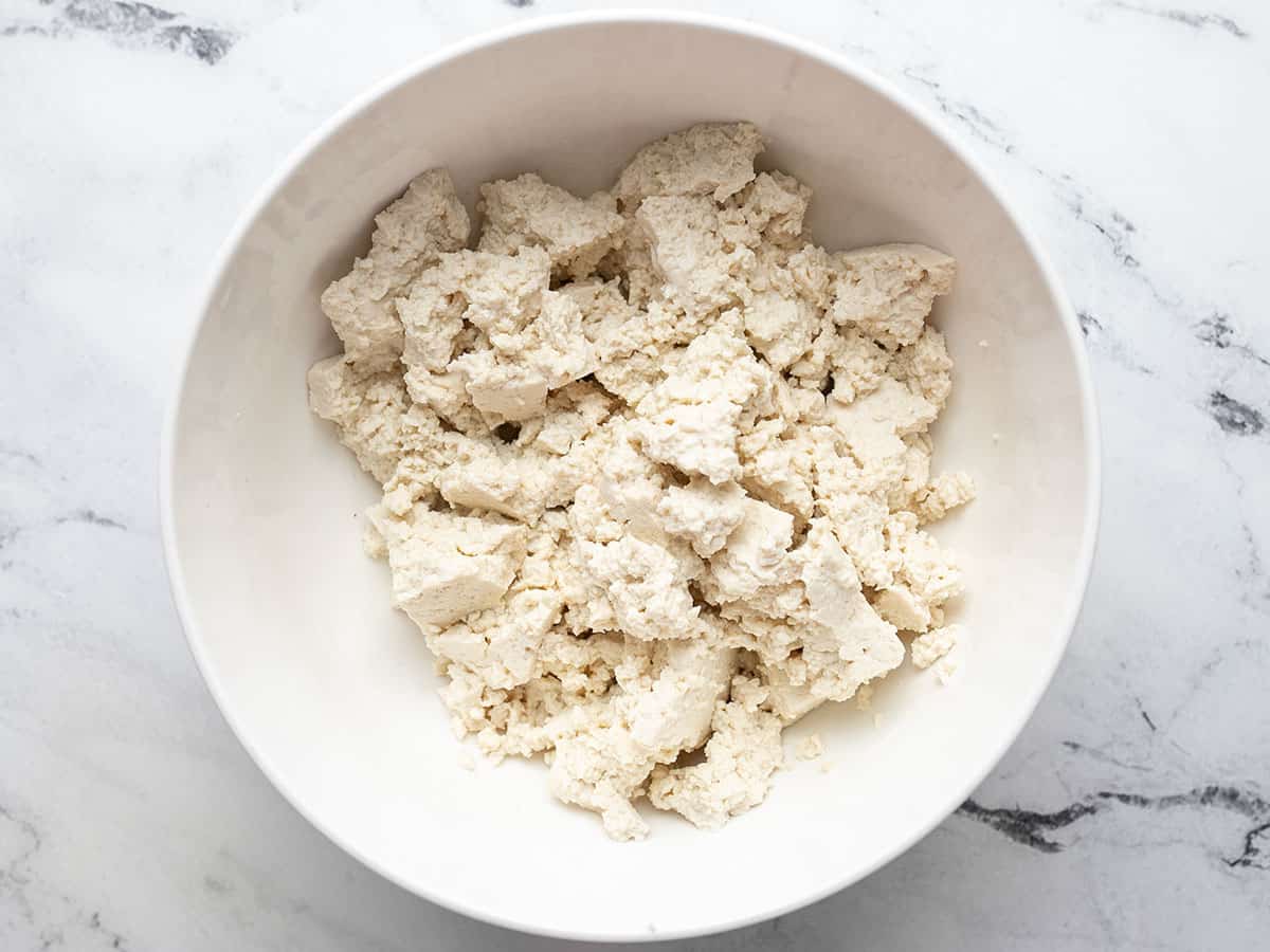 Crumbled tofu in a bowl.