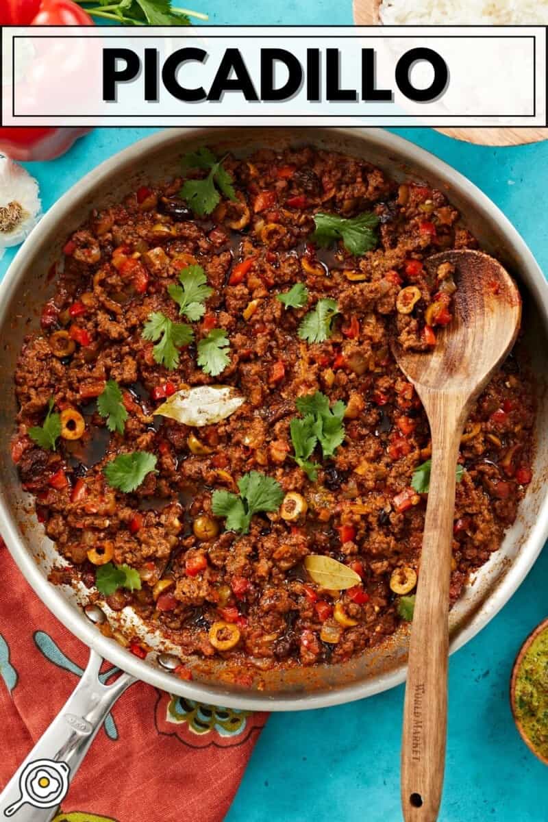 Overhead view of a skillet full of picadillo.