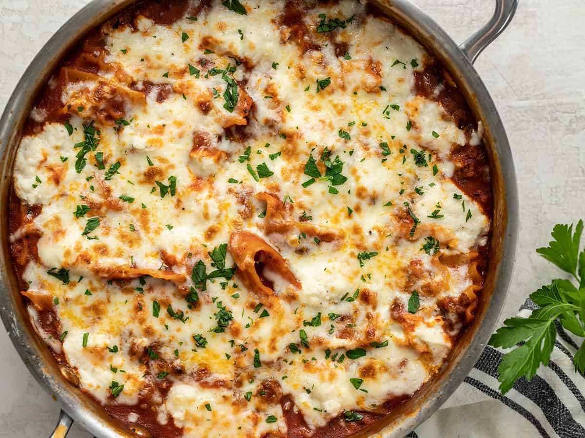 Overhead view of freshly baked skillet lasagna.