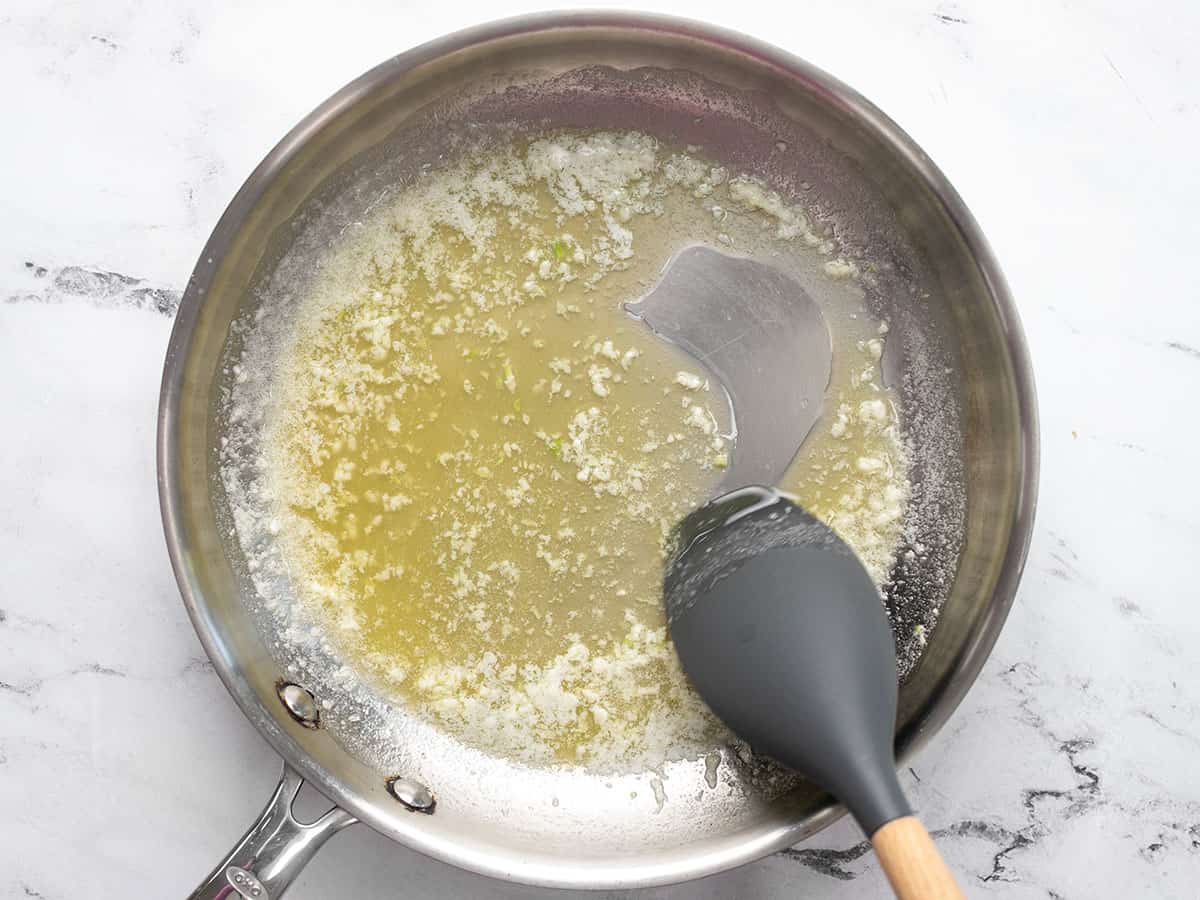 Butter and garlic in a skillet.