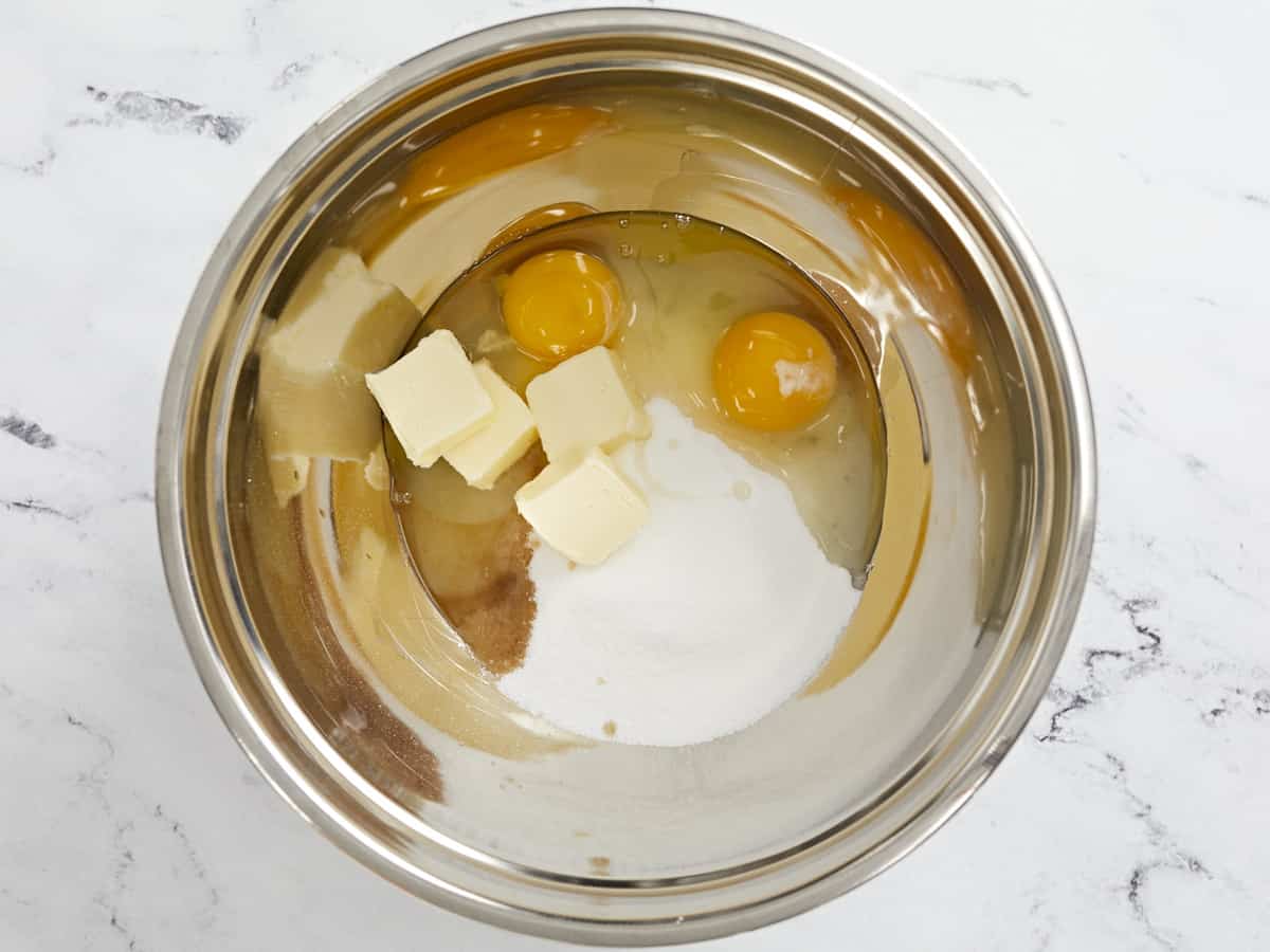 wet ingredients for biscotti in a mixing bowl, not yet mixed.