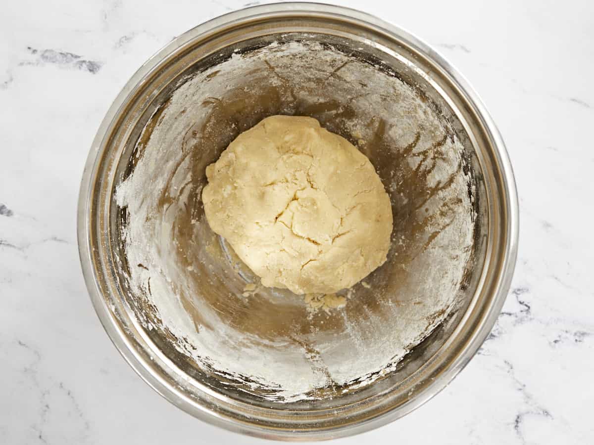 Wet and dry ingredients combined into a ball of dough.