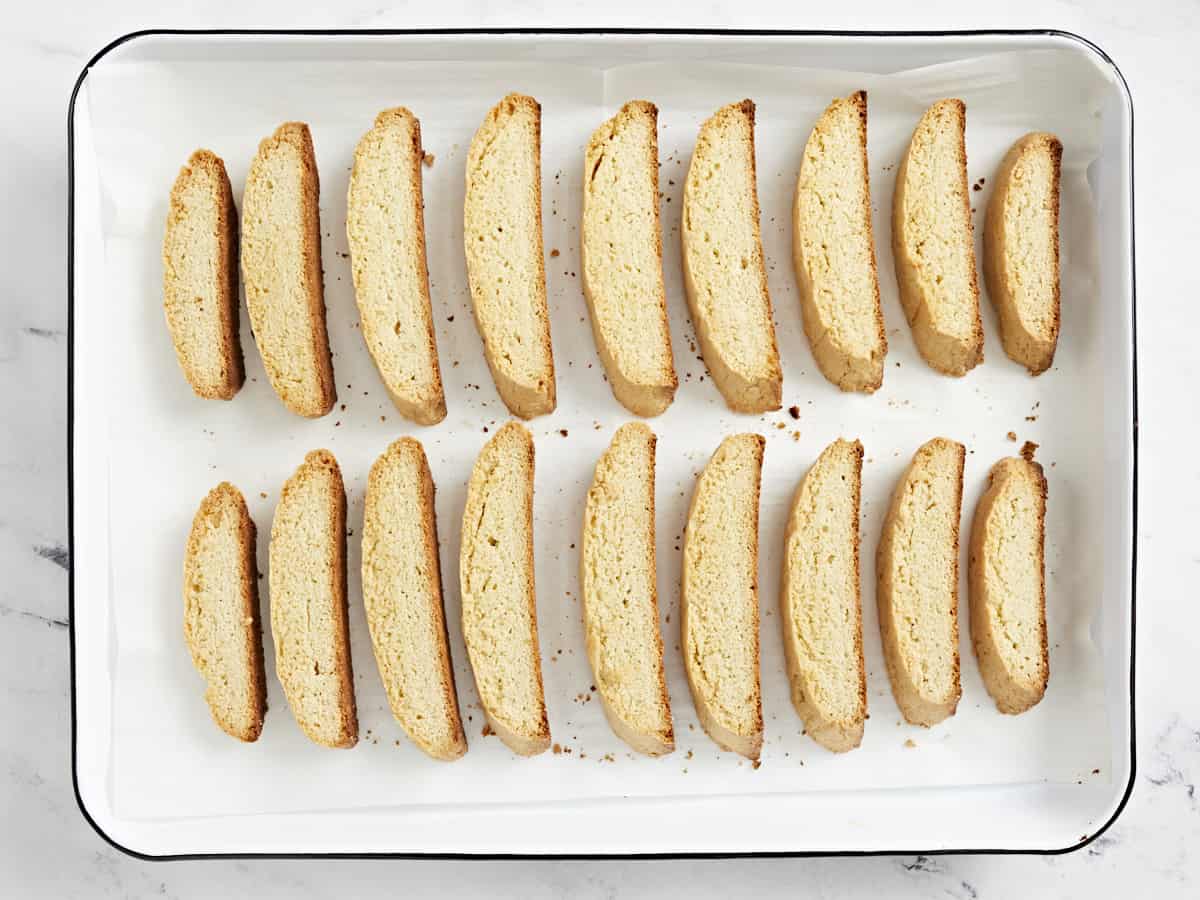 Fully baked biscotti on a baking sheet.