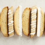 Biscotti lined up in a row showing different decorations.