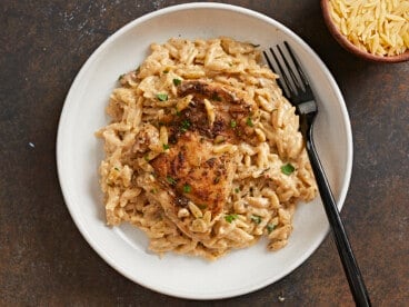 Overhead shot of Creamy Chicken and Orzo in a white bowl.