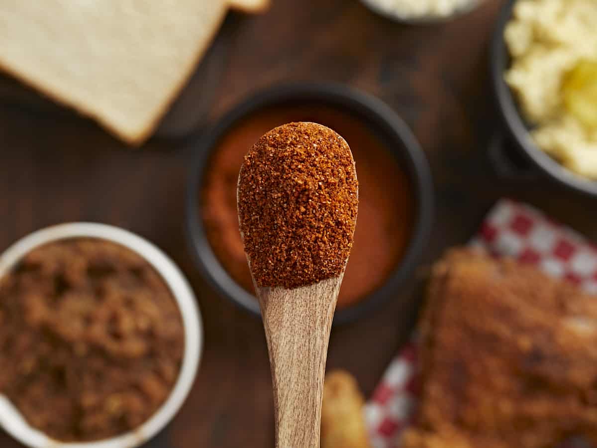 Overhead close up shot of Nashville Hot Seasoning on a wood spoon.