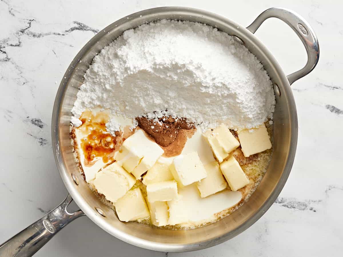 Ingredients for the icing in a pan.