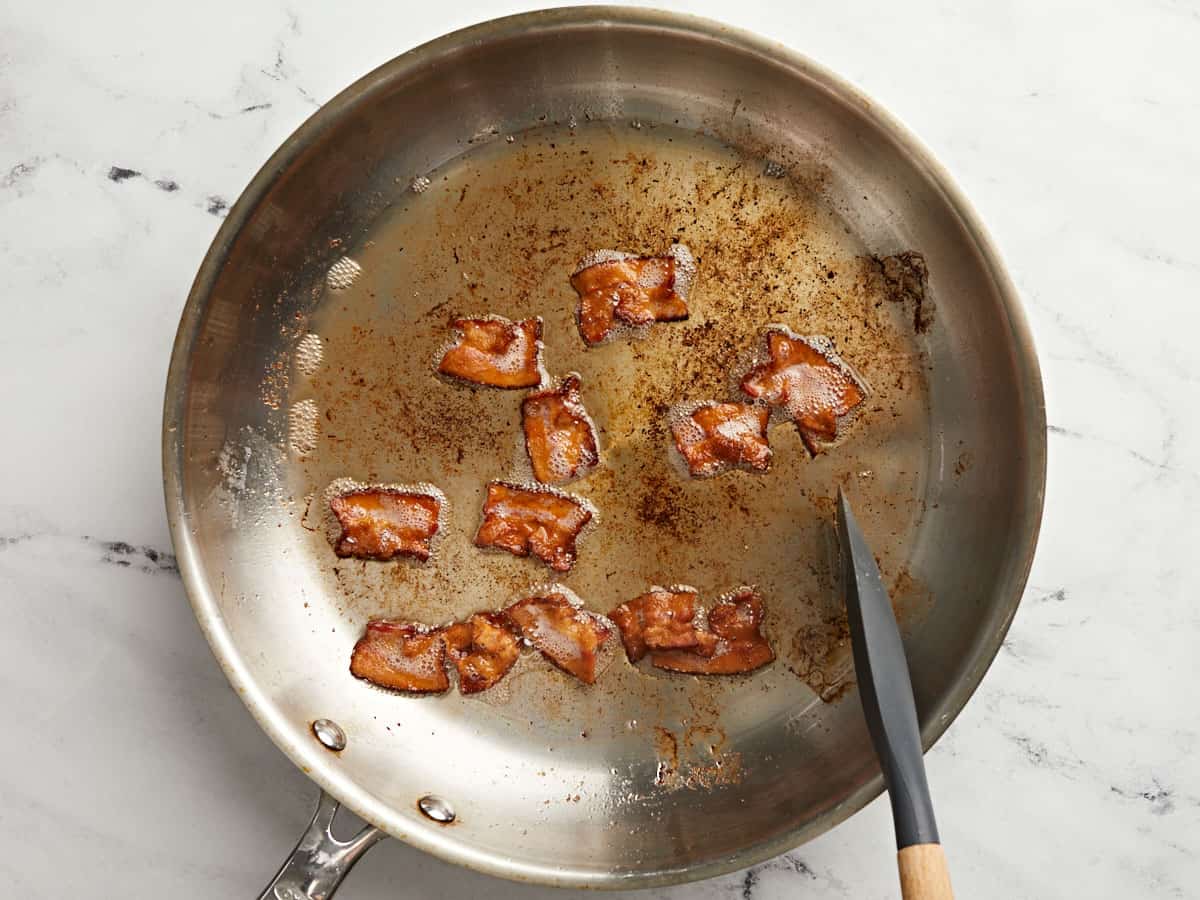 Cooked bacon in a skillet.