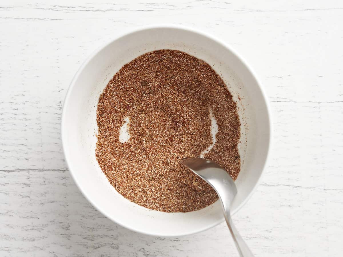 Stirred burger seasoning in the bowl. 