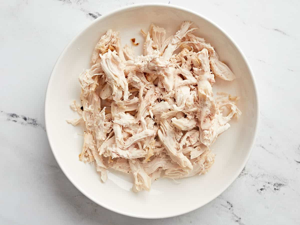 Shredded chicken in a bowl.