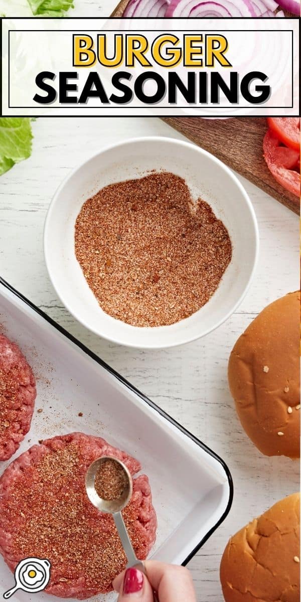 Overhead view of burgers being seasoned.