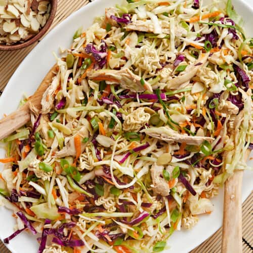 Overhead view of ramen noodle salad on an oval serving platter.