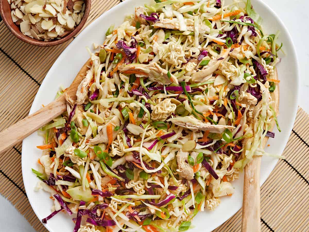 Overhead view of ramen noodle salad on an oval serving platter.