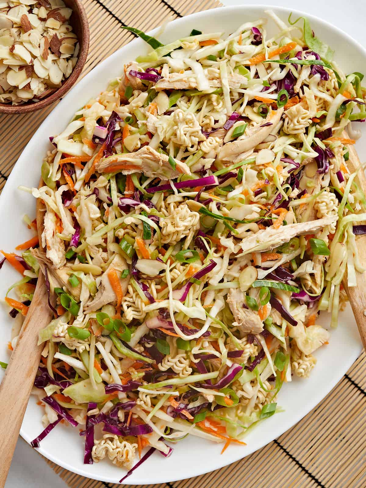 Close up overhead image of ramen noodle salad on an oval platter.