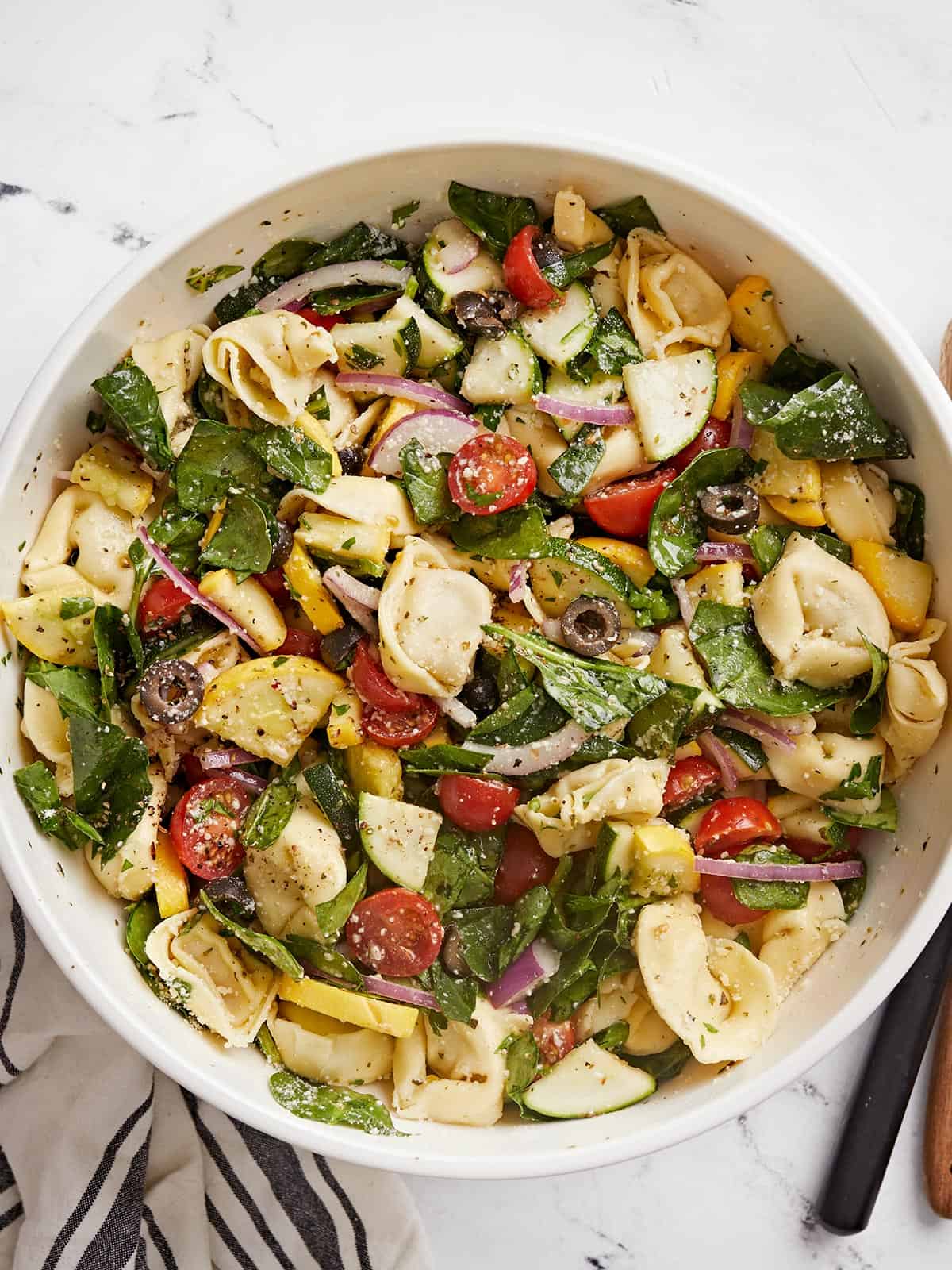 Overhead view of a bowl full of tortellini salad.