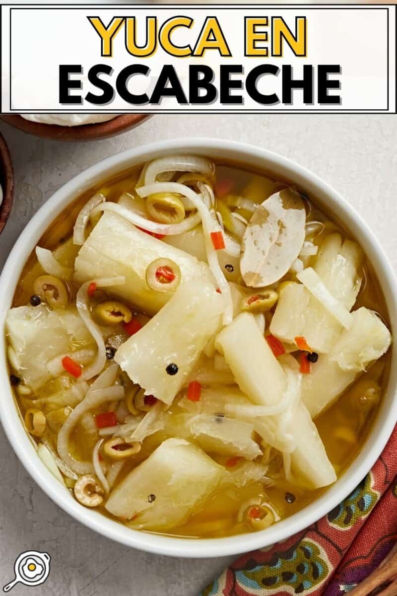 Overhead shot of Yuca En Escabeche in a white bowl.