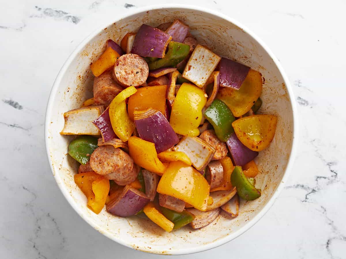 Seasoned sausage and vegetables in the bowl.