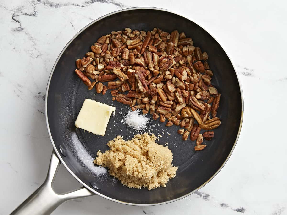 Chopped pecans, butter and brown sugar in a nonstick skillet